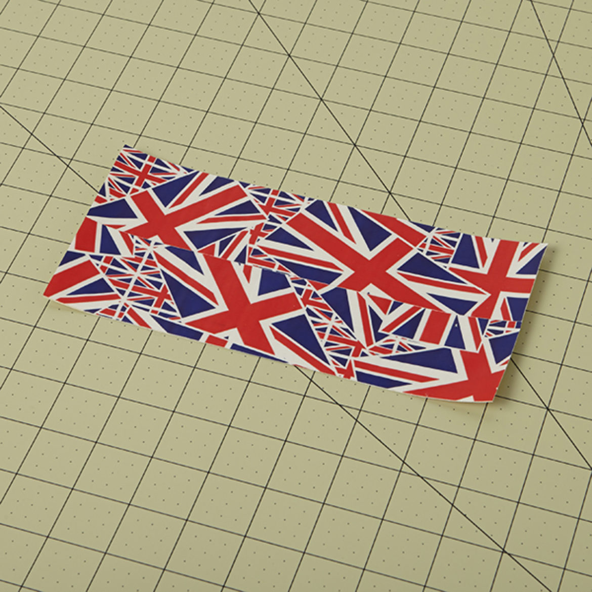 Two pieces of Duck Tape fabric made by laying overlapped sheets of Duck Tape over each other, sticky side against sticky side
