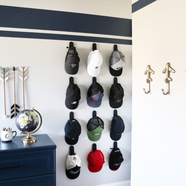 Abby Organizes Hat Wall Reel Cover
