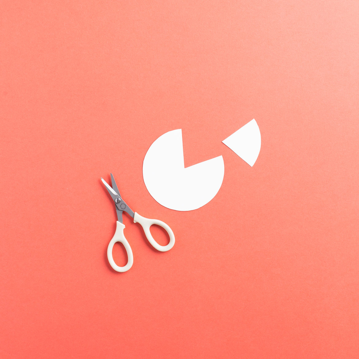 A roll of Duck Tape traced onto cardstock and cut out. Then a small wedge cut out of the circle